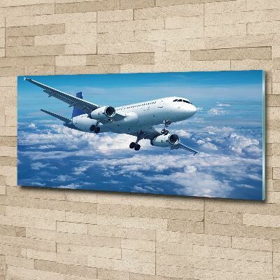 Quadro vetro acrilico Un aereo tra le nuvole