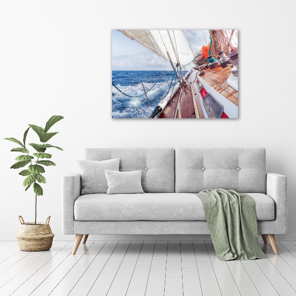 Quadro in vetro acrilico Una barca a vela in mare