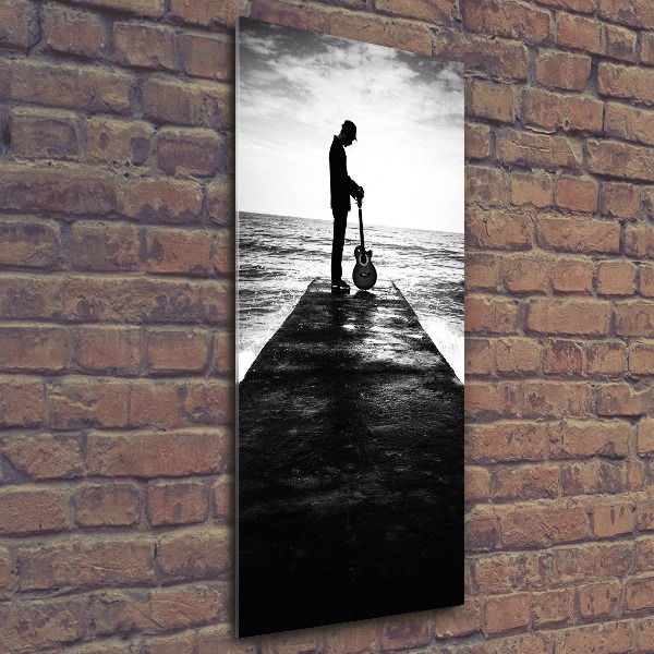 Quadro in vetro acrilico verticale Chitarrista sul molo