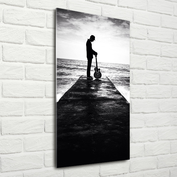 Quadro in vetro acrilico verticale Chitarrista sul molo