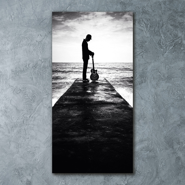 Quadro in vetro acrilico verticale Chitarrista sul molo