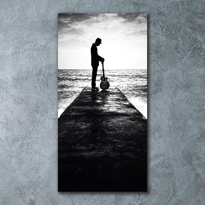 Quadro in vetro acrilico verticale Chitarrista sul molo