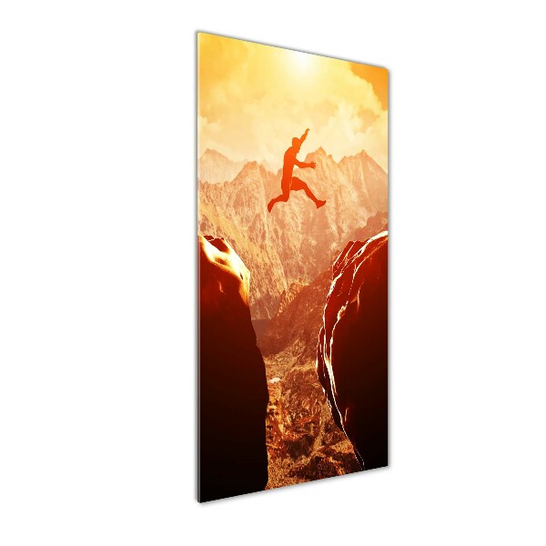 Quadro stampa su vetro acrilico verticale Salta oltre l'abisso