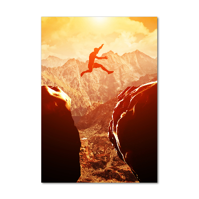 Quadro stampa su vetro acrilico verticale Salta oltre l'abisso