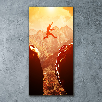 Quadro stampa su vetro acrilico verticale Salta oltre l'abisso