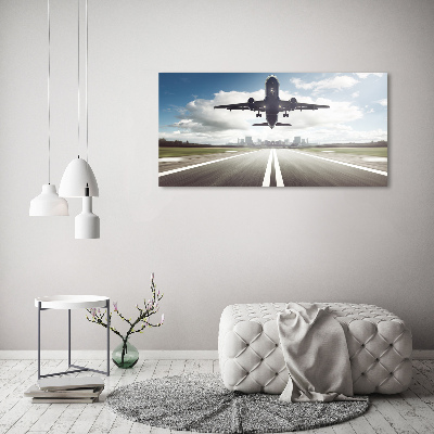 Foto quadro su tela Un aereo in fase di decollo