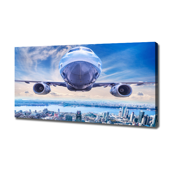 Quadro su tela Un aereo sopra la città