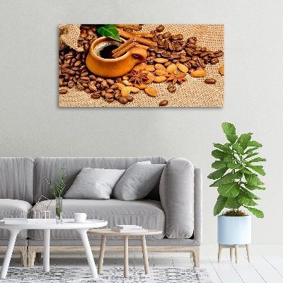 Foto quadro su tela Chicchi di caffè e una tazza