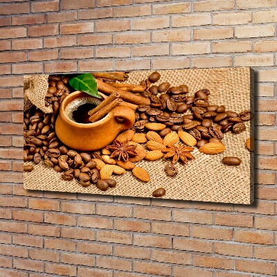 Foto quadro su tela Chicchi di caffè e una tazza