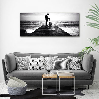 Foto quadro su tela Chitarrista sul molo