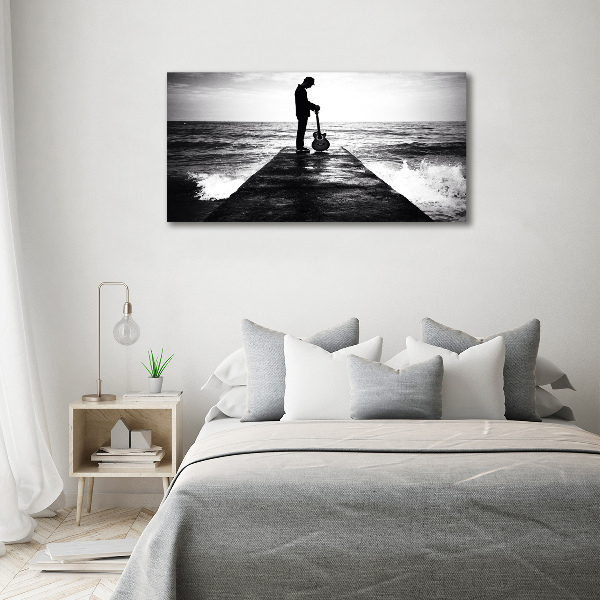 Foto quadro su tela Chitarrista sul molo