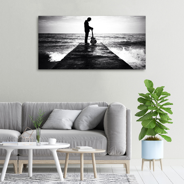 Foto quadro su tela Chitarrista sul molo