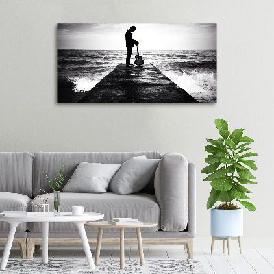 Foto quadro su tela Chitarrista sul molo