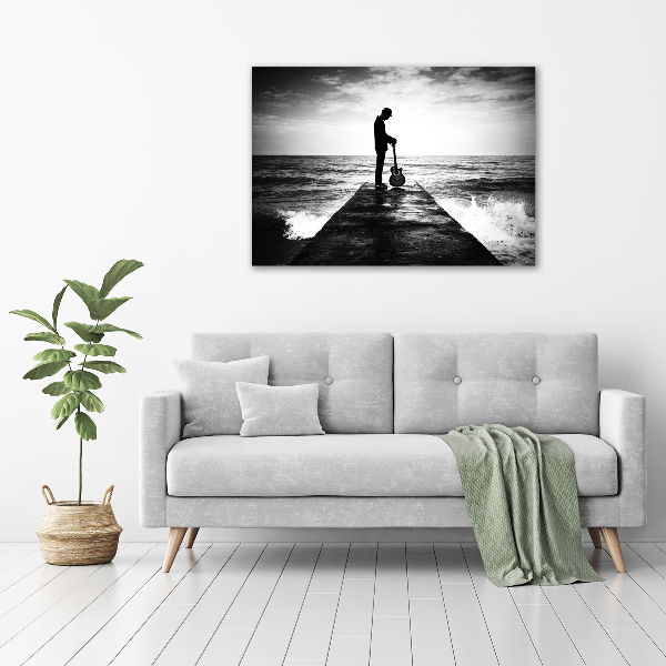 Foto quadro su tela Chitarrista sul molo