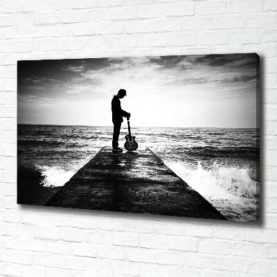 Foto quadro su tela Chitarrista sul molo