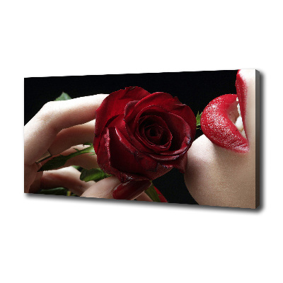 Foto quadro su tela Donna con una rosa