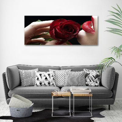Foto quadro su tela Donna con una rosa