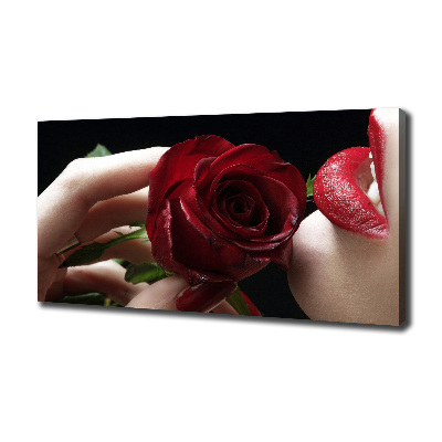 Foto quadro su tela Donna con una rosa