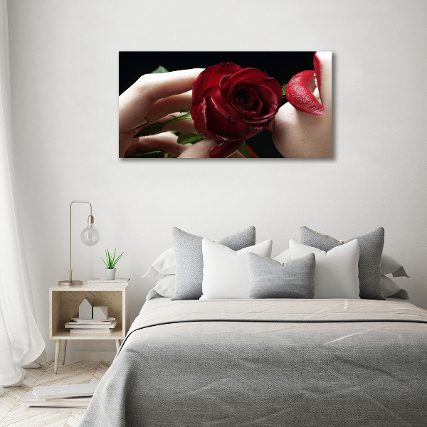 Foto quadro su tela Donna con una rosa