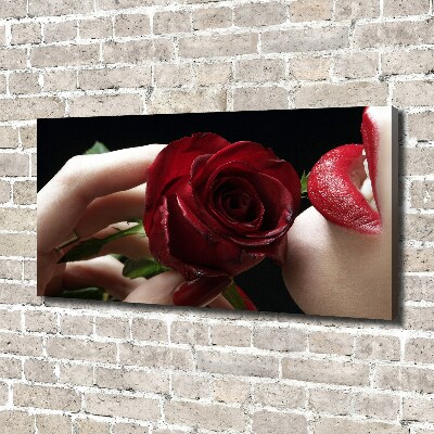 Foto quadro su tela Donna con una rosa