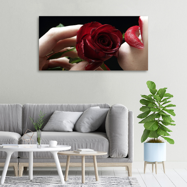 Foto quadro su tela Donna con una rosa