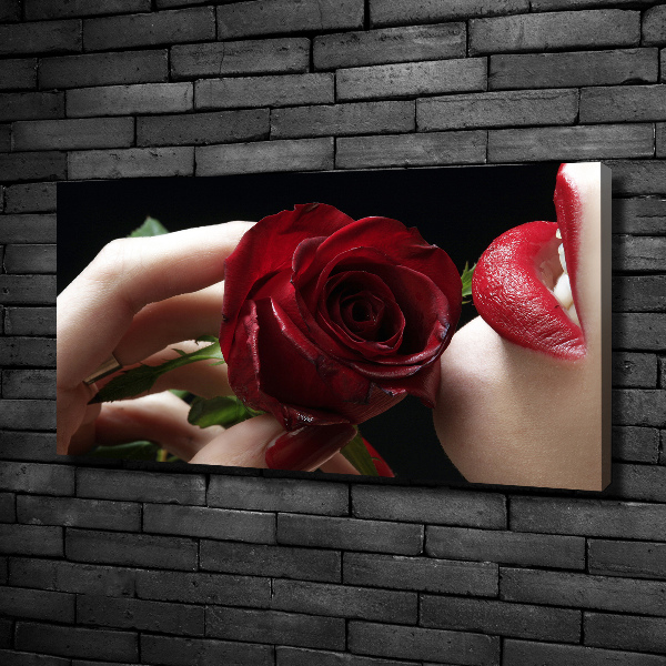 Foto quadro su tela Donna con una rosa