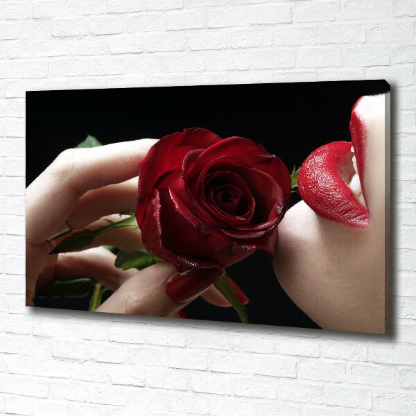 Foto quadro su tela Donna con una rosa