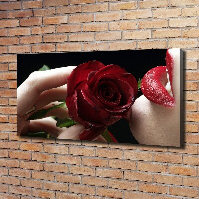 Foto quadro su tela Donna con una rosa