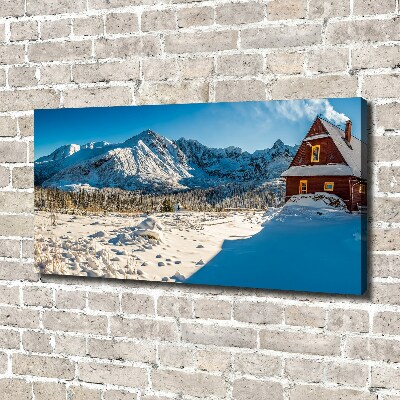Foto quadro su tela Un cottage in montagna