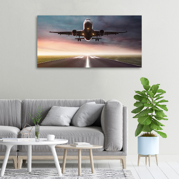 Foto quadro su tela Un aereo in fase di decollo