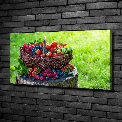 Foto quadro su tela Un cesto di frutti di bosco