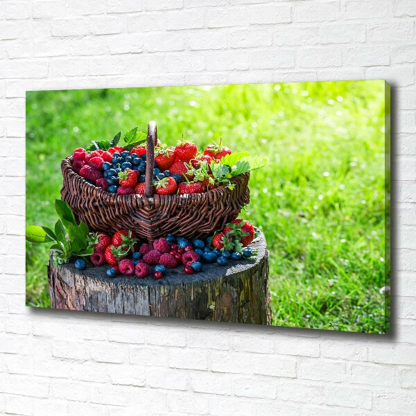 Foto quadro su tela Un cesto di frutti di bosco