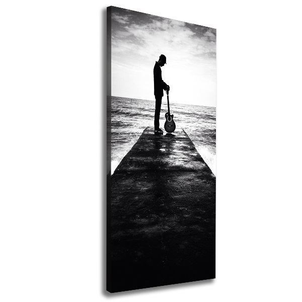 Stampa quadro su tela verticale Chitarrista sul molo