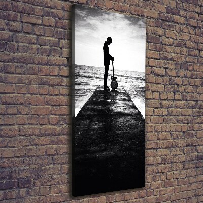 Stampa quadro su tela verticale Chitarrista sul molo