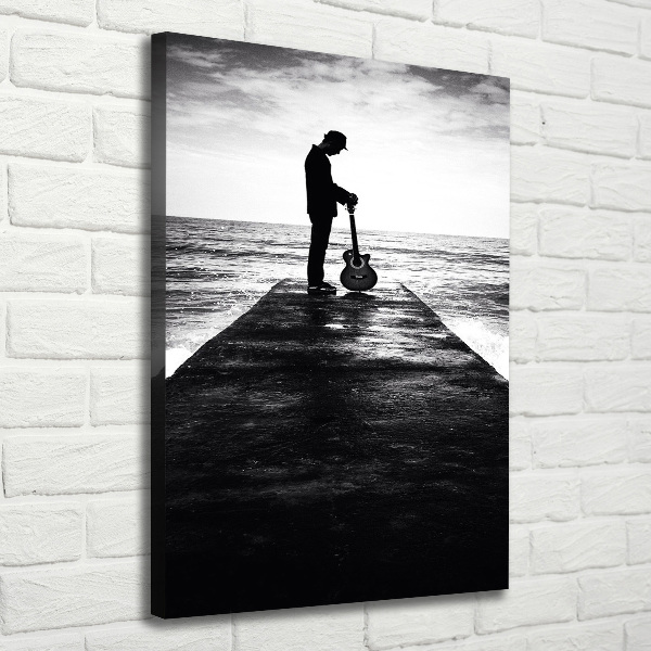 Stampa quadro su tela verticale Chitarrista sul molo
