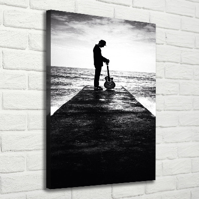 Stampa quadro su tela verticale Chitarrista sul molo