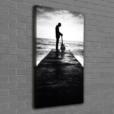 Stampa quadro su tela verticale Chitarrista sul molo
