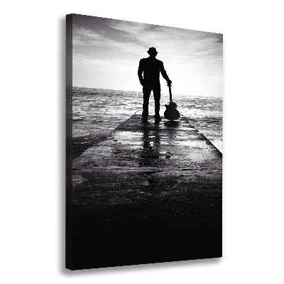 Quadro foto su tela verticale Chitarrista sul molo