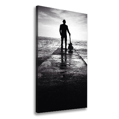 Quadro foto su tela verticale Chitarrista sul molo