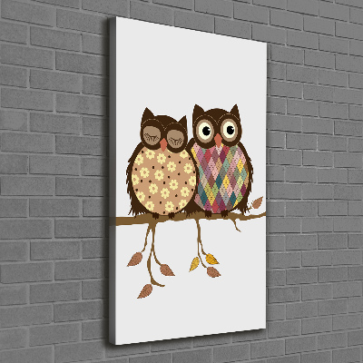 Quadro foto su tela verticale Una coppia di gufi su un ramo