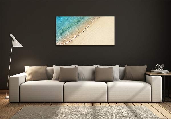 Quadro vetro Un'onda sulla spiaggia