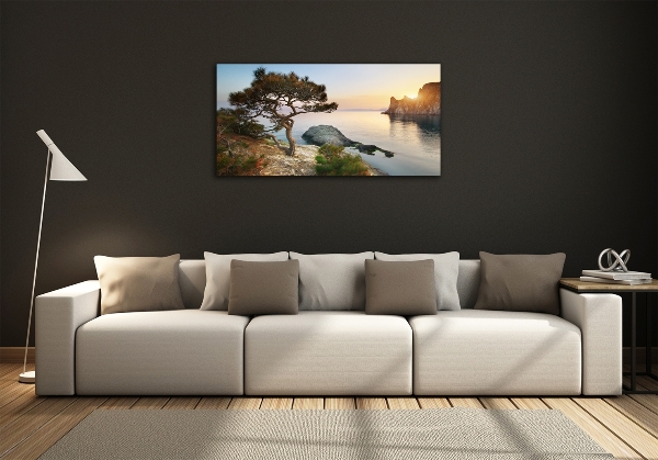 Quadro su vetro Un albero in riva al mare