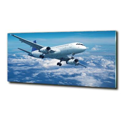 Quadro su vetro Un aereo tra le nuvole