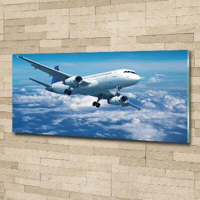Quadro su vetro Un aereo tra le nuvole