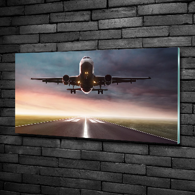 Quadro vetro Un aereo in fase di decollo