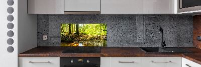 Rivestimento parete cucina con motivo «Raggi di sole nella foresta»