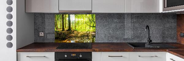 Rivestimento parete cucina con motivo «Raggi di sole nella foresta»
