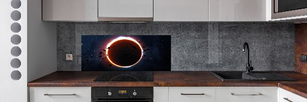 Rivestimento parete cucina con motivo «Eclissi solare»