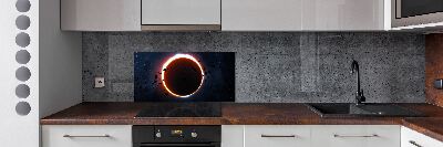 Rivestimento parete cucina con motivo «Eclissi solare»