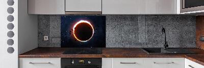 Rivestimento parete cucina con motivo «Eclissi solare»